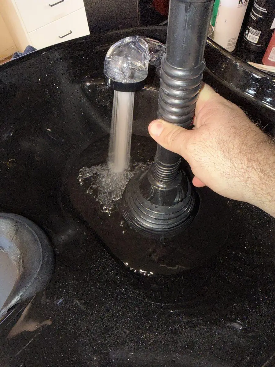 Basin draining freely after SOS Drain Cleaning cleared the blockage